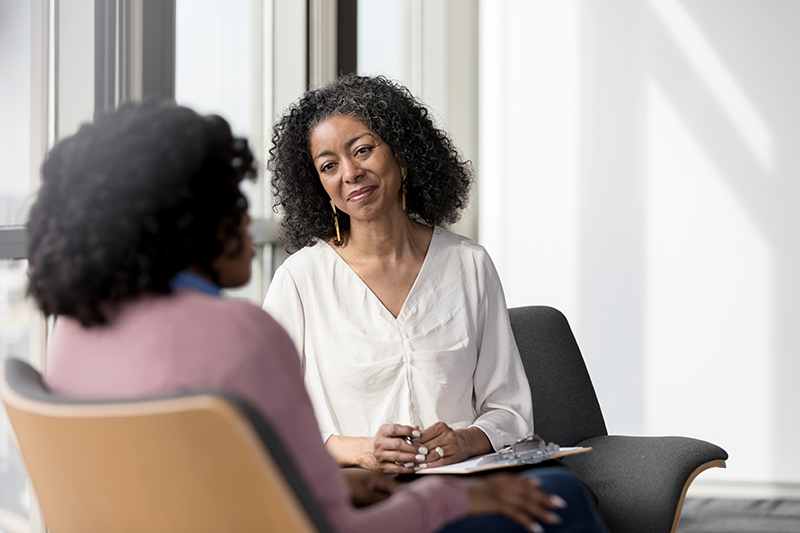 Woman talking to therapist.