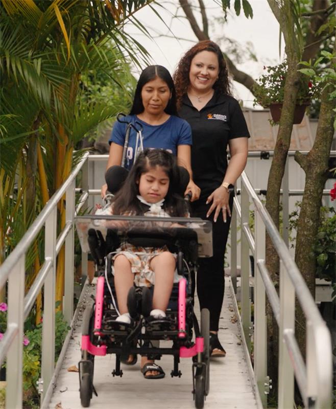 Nine-year old Milagros Garcia, her mother Isabel and CMS Health Plan Care Manager Carolina Campos.