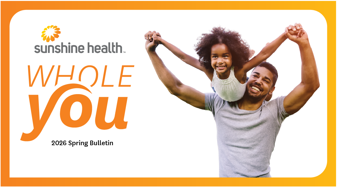 Sunshine Health Whole You Spring 2026 Bulletin. Dad lifting daughter over his head like an airplane.